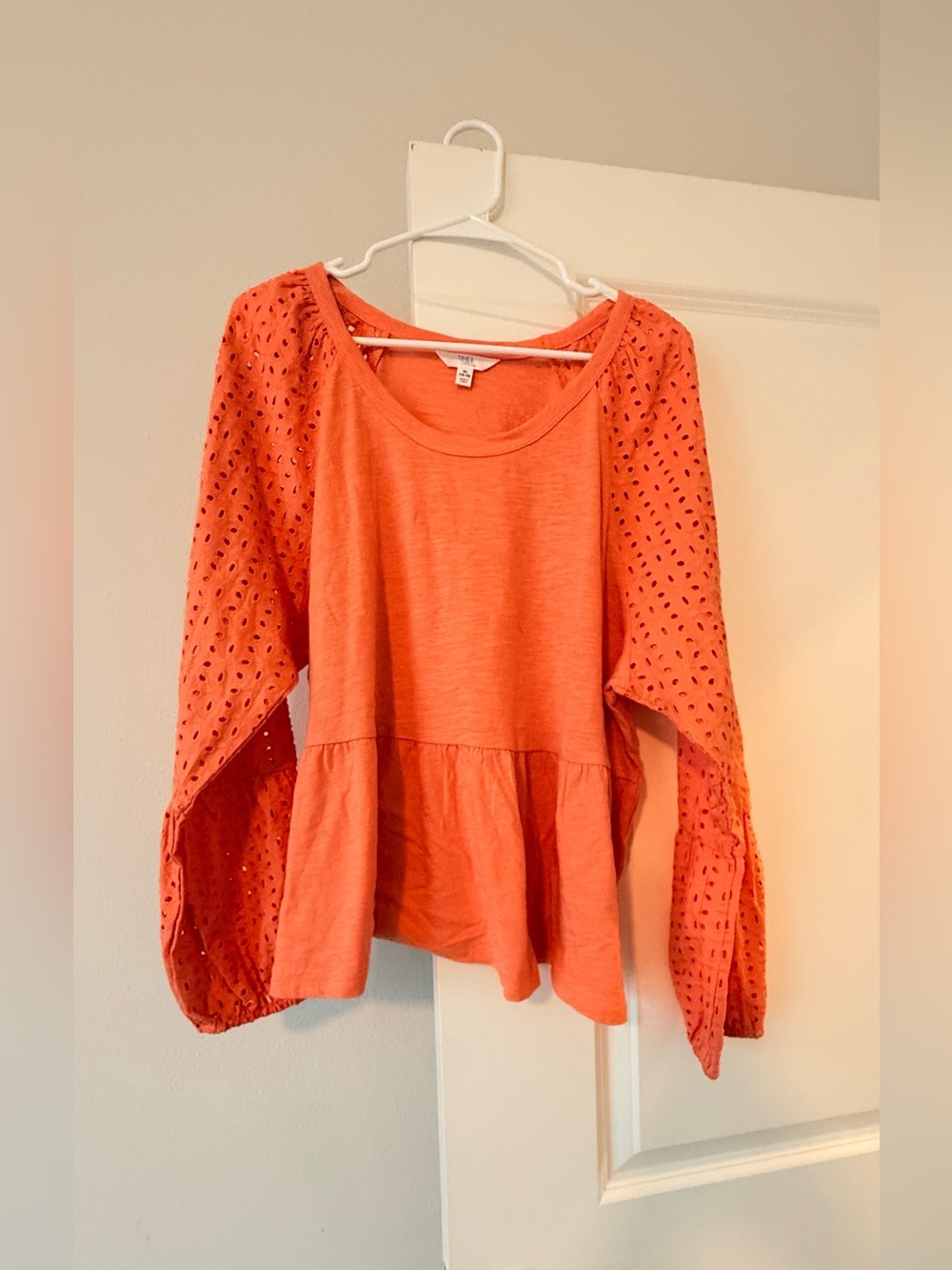 Women’s Coral Eyelet Sleeve Peplum Top